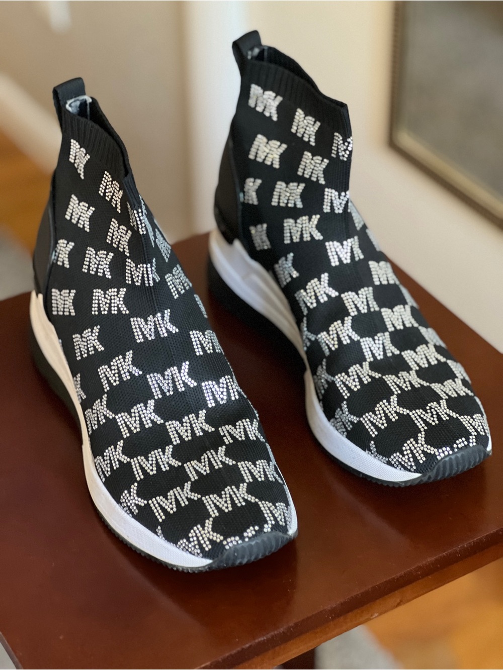 Michael Kors Black and White MK Logo Slip-On Knit Sneakers